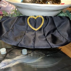 Satin clutch w yellow rhinestone heart closure